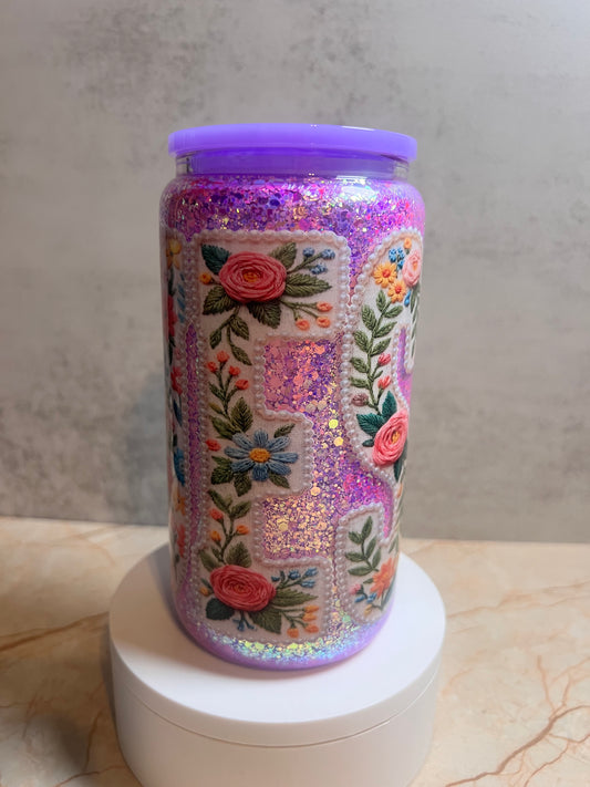 Jesus with water beads, glitter, and purple lid.